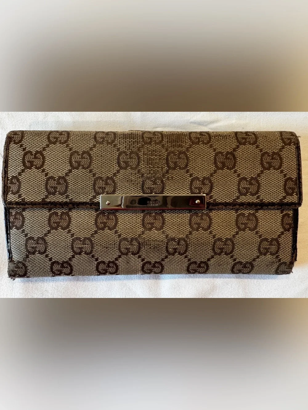 Authentic pre Loved Gucci Brown Monogram Continental Wallet.